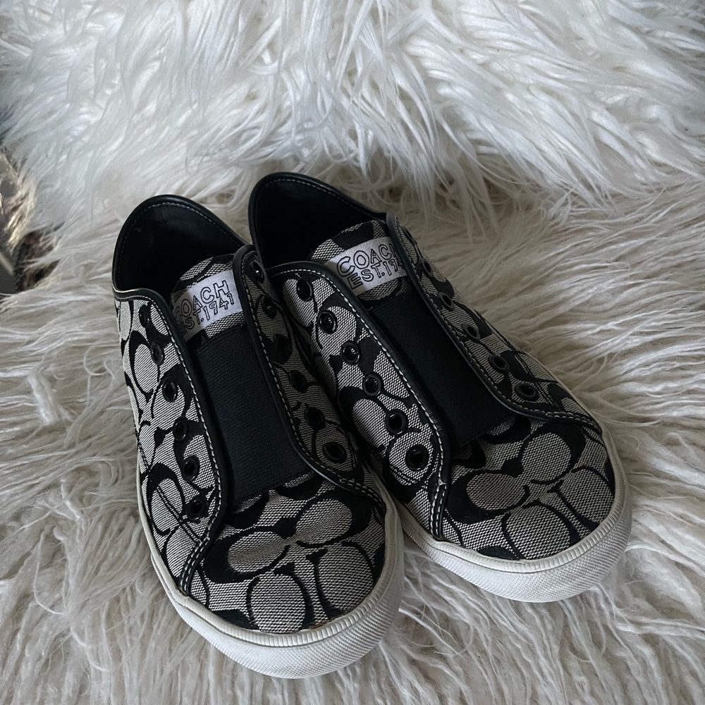 Coach Black and White Sneakers with Signature Design
Pattern.
